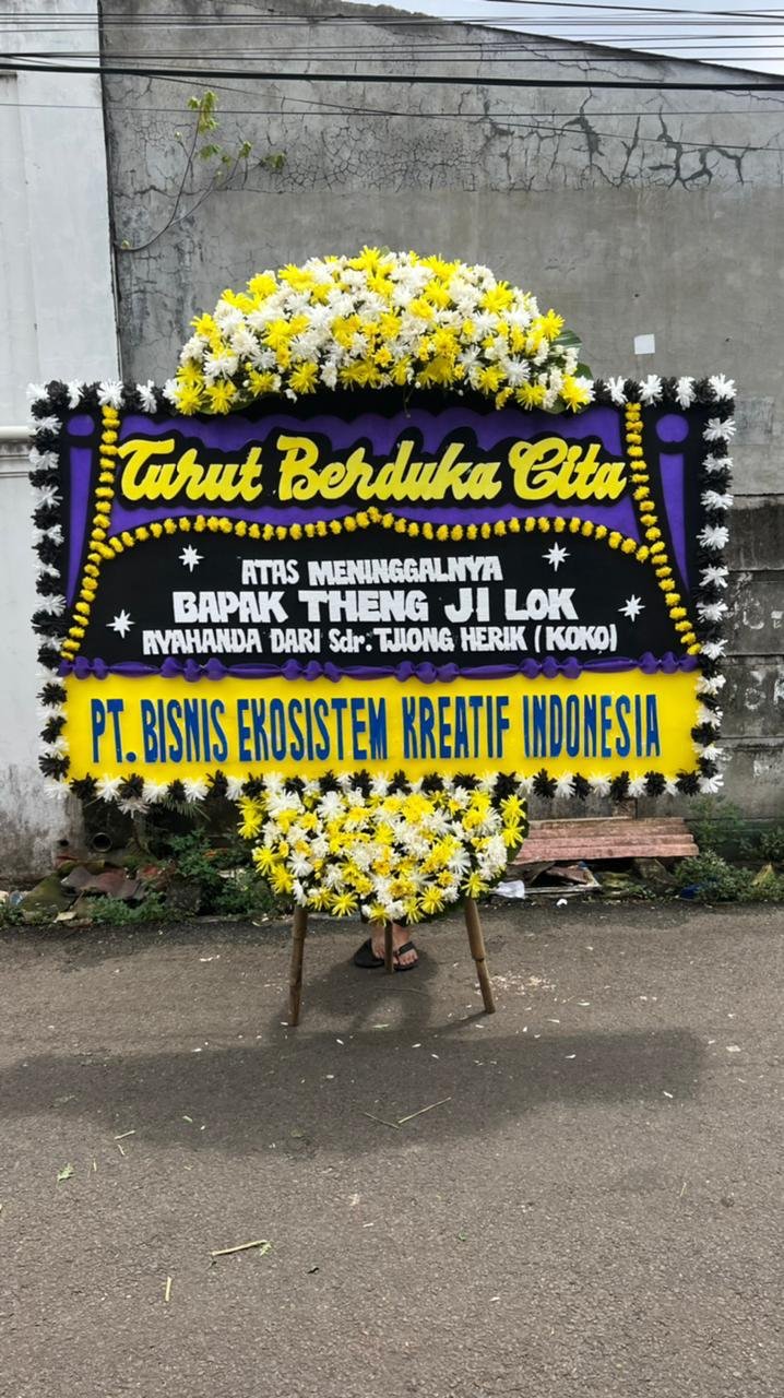 Bunga papan duka cita ungu kuning Sukawangi